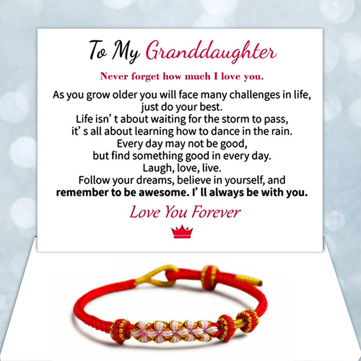 Close up of women knot bracelet with sentimental greeting card