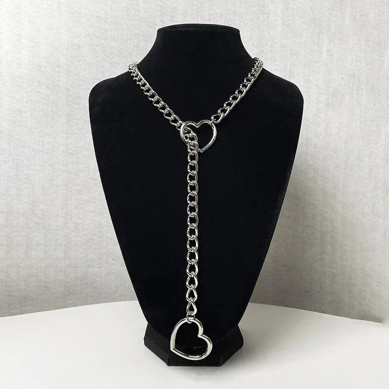 Gothic punk heart-shaped Y-necklace displayed on a black mannequin bust