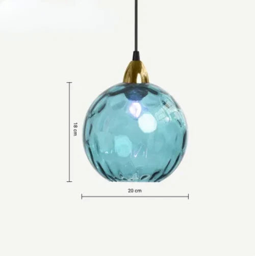 Illuminated glass globe ceiling lamp casting warm light