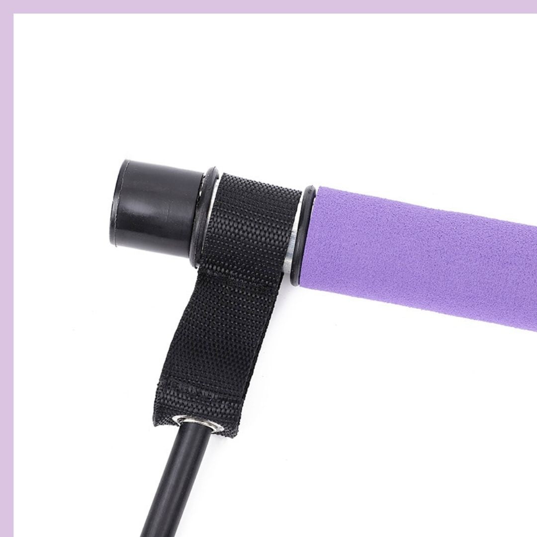 Close-up of the foam grip and attachment ring on the pilates bar