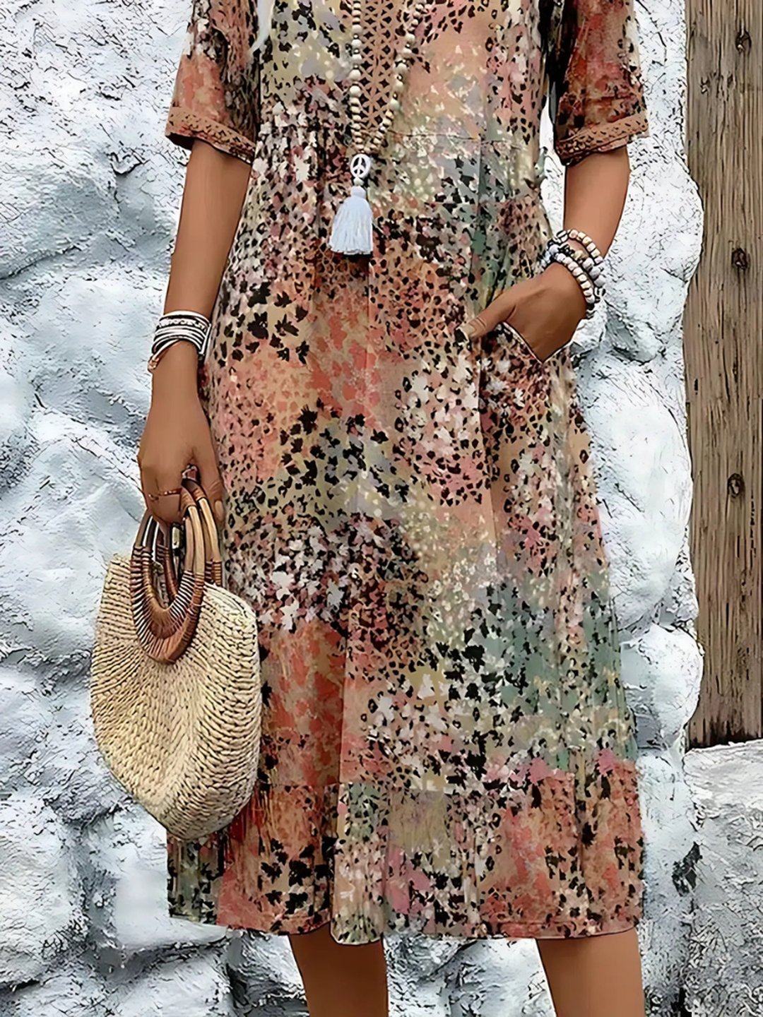 Model wearing vibrant women mid length summer dress with stylish accessories for casual wear