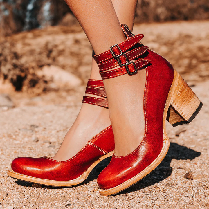 Vibrant red classic strap heels showcasing triple ankle buckle straps