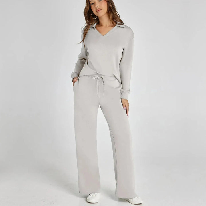 Cozy two-piece set featuring a relaxed fit sweatshirt and trousers