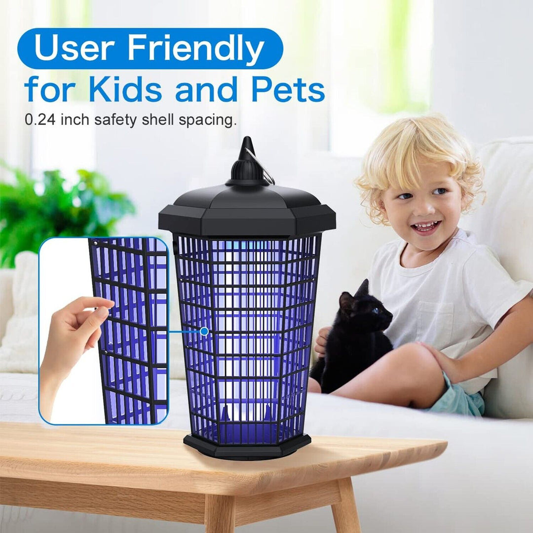 Electric bug zapper placed on a table near a child and a cat