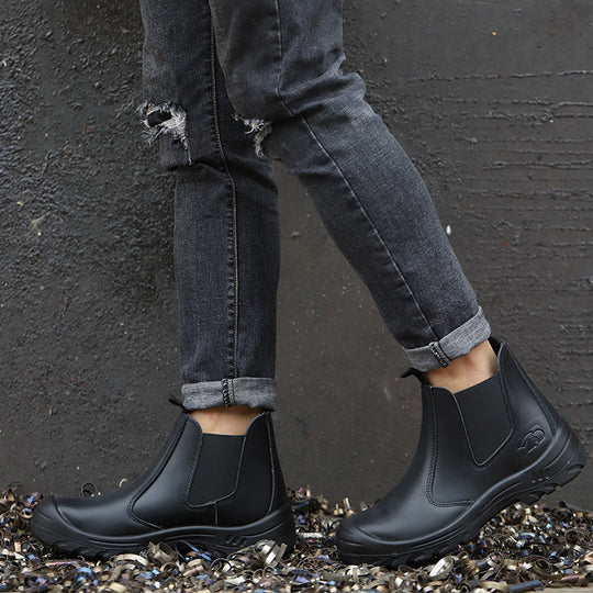 Textured rubber outsole of mens slip resistant work boots for superior traction