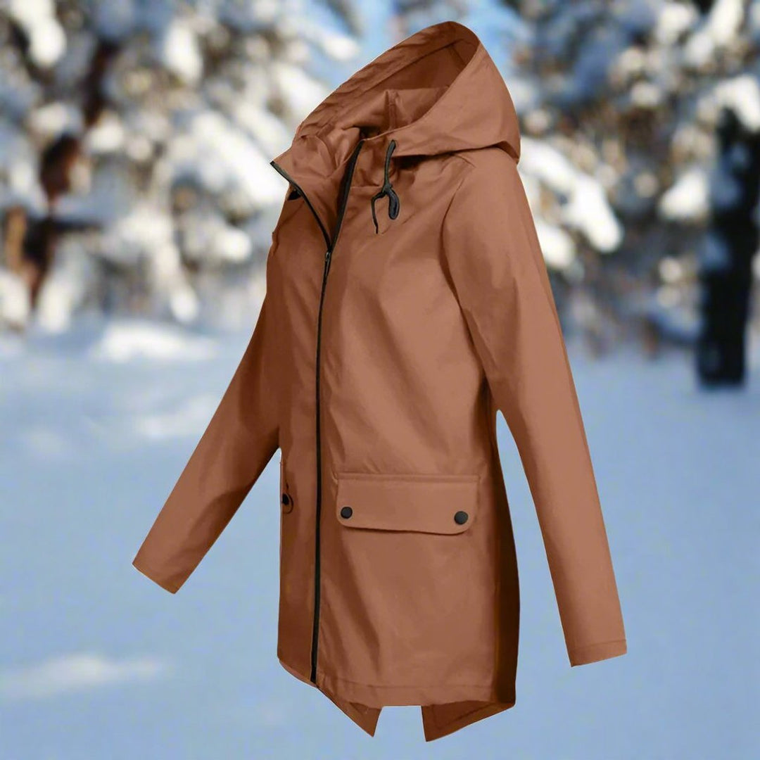 Side profile of women's weatherproof rain jacket with adjustable hood