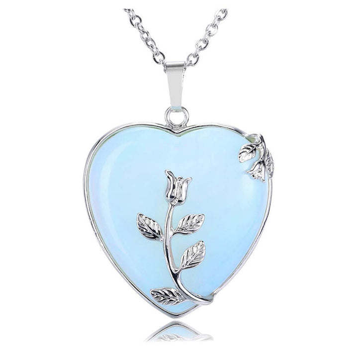 Complete view of the women's crystal heart necklace packaging and pendant