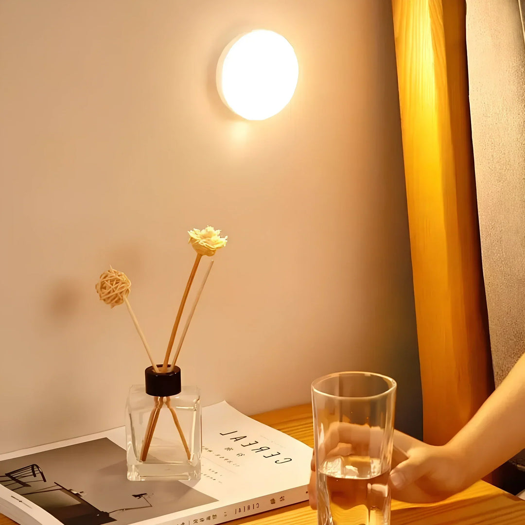 Smart sensor LED light attached to a bookshelf for modern home decor