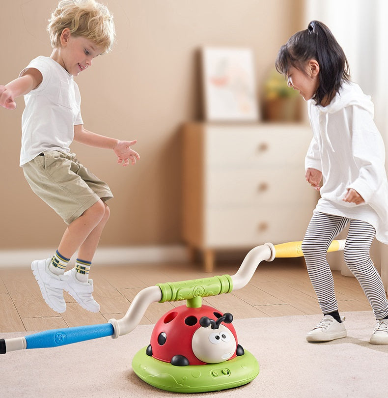 Young children jumping and playing with the multi-activity toy set indoors