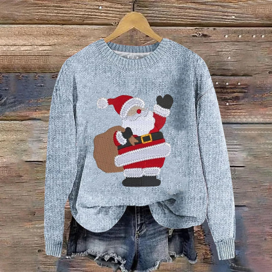 Flat lay of womens Christmas sweater styled with seasonal accessories and shoes