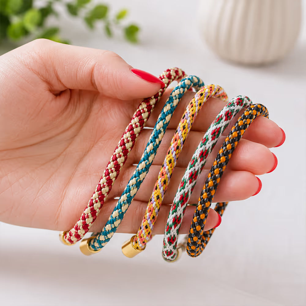 Kumihimo disc and colorful embroidery floss threads for bracelet making