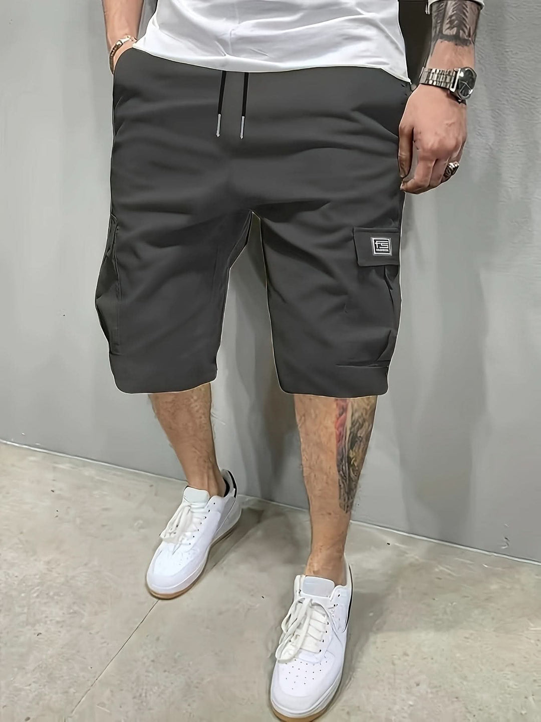 Waistband and belt loop detail on mens outdoor clothing shorts