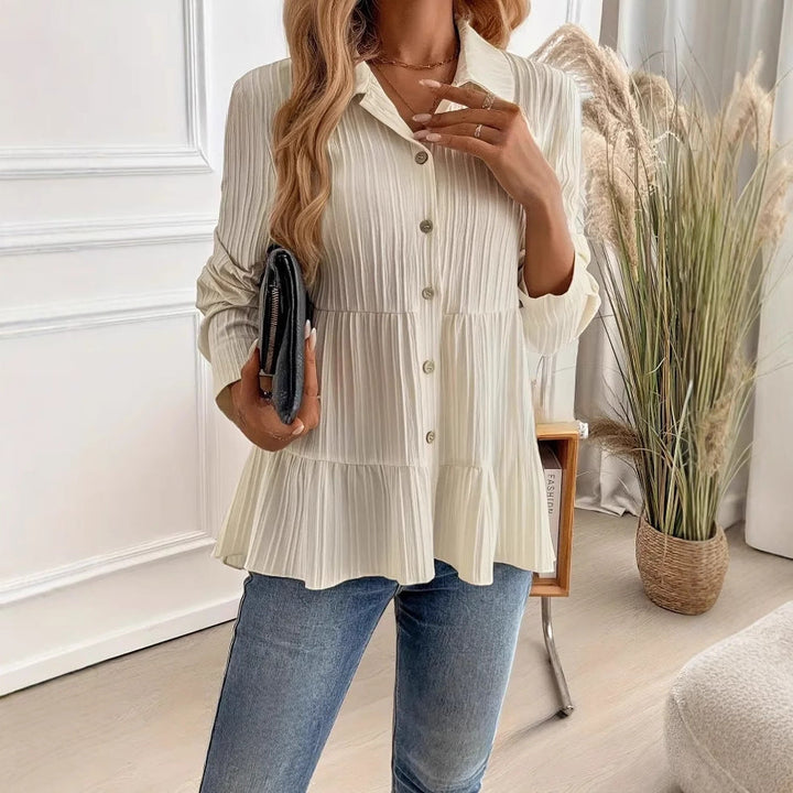 Long sleeve beige pullover shirt for women with chic button details for workwear or casual wear