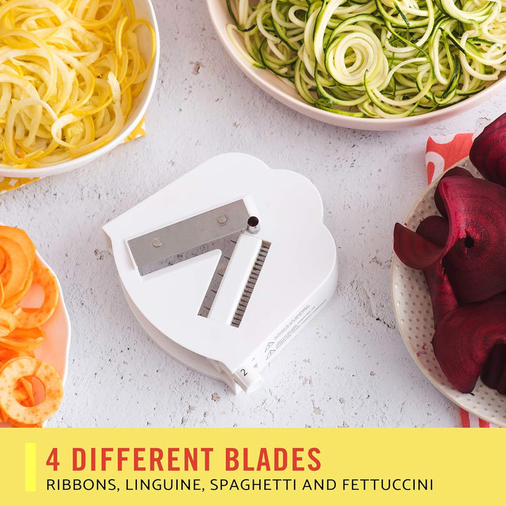Four interchangeable stainless steel blades for vegetable cutting