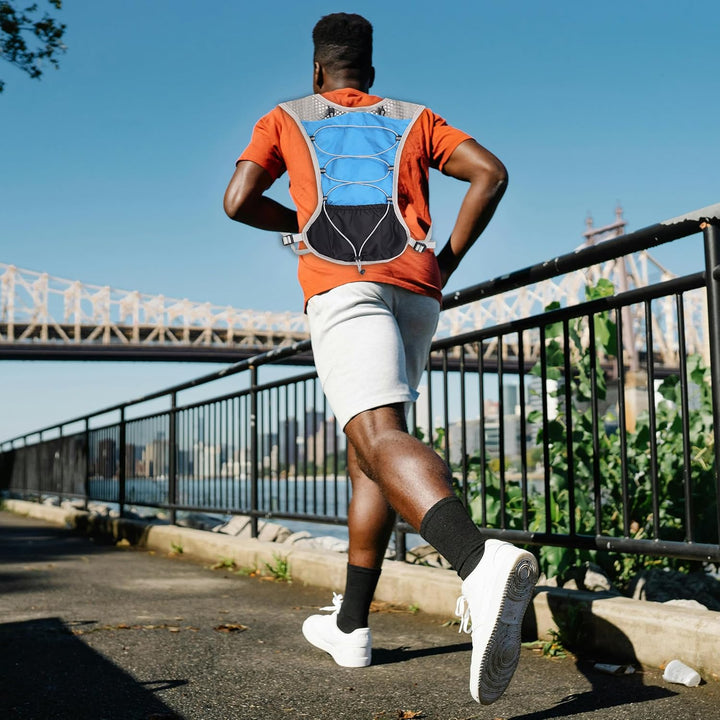 Hydration tube routing system on ultra-light running vest shoulder strap