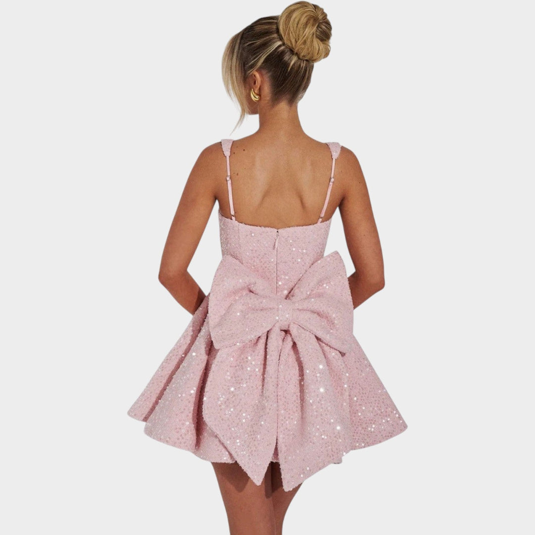 Back view of women's sequin square neck fit and flare mini cocktail party dress showcasing evening wear design