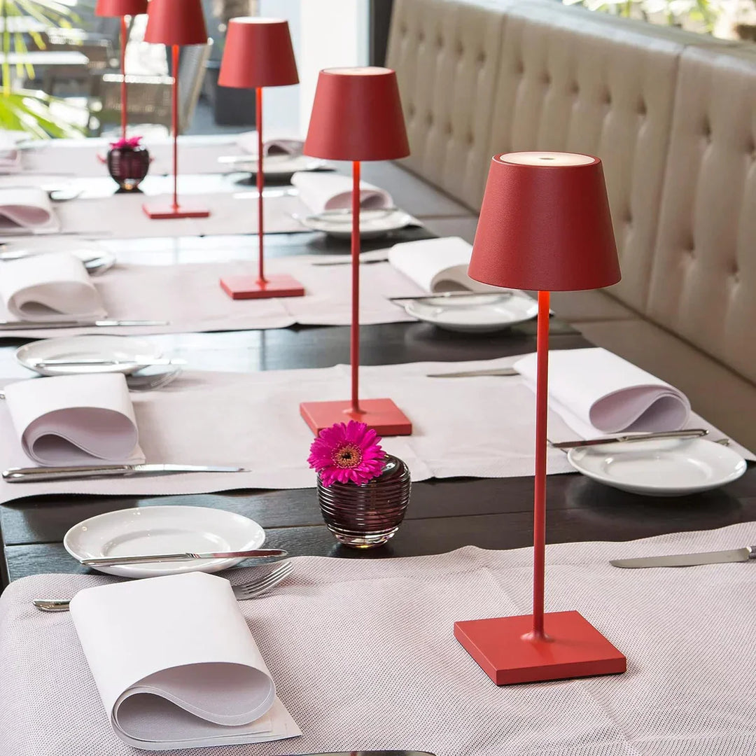 Cordless rechargeable LED table lamp showing touch control on top