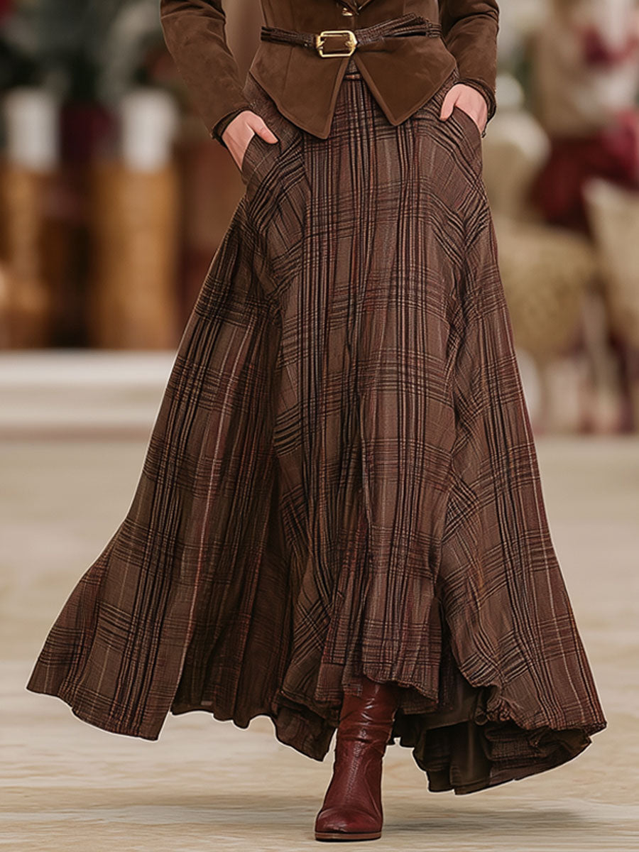 Model wearing a brown plaid elastic waist midi skirt with side pockets and boots
