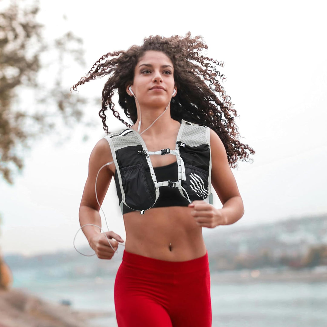 Accessible front flask pockets on hydration running pack