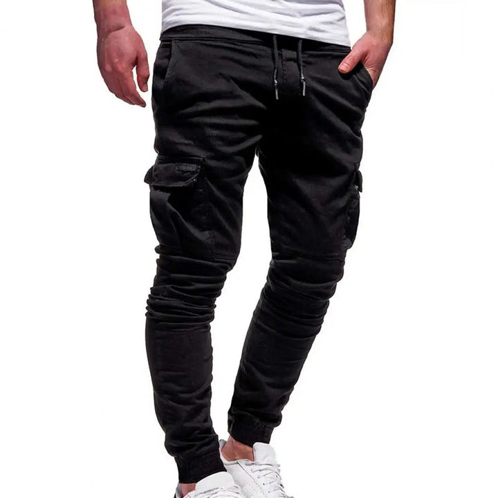 Men's stretch cargo pants in black front view, casual streetwear trousers