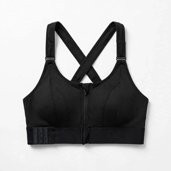 Flat lay view of black sports bra showing criss cross back straps