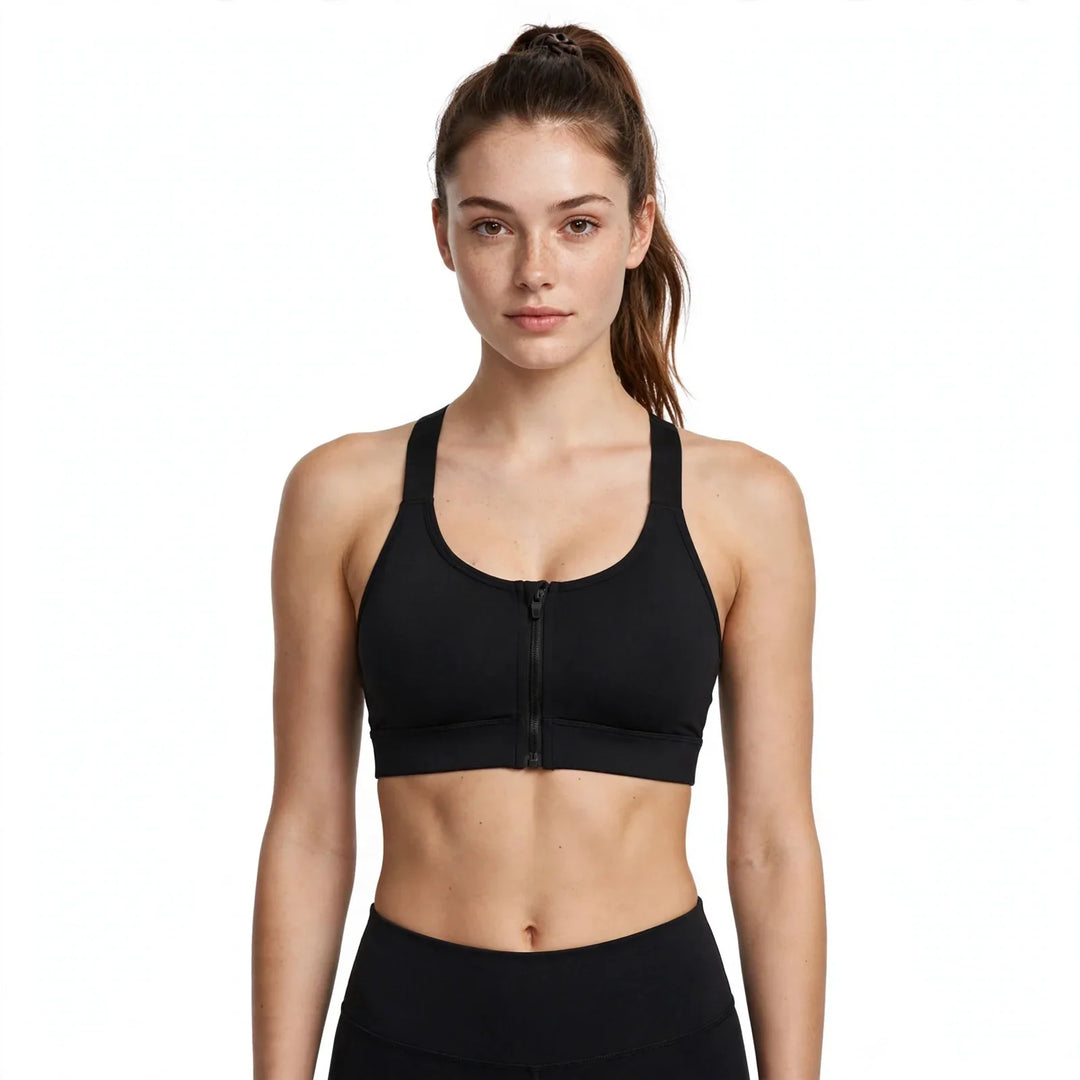 Model wearing black front zip sports bra from the front