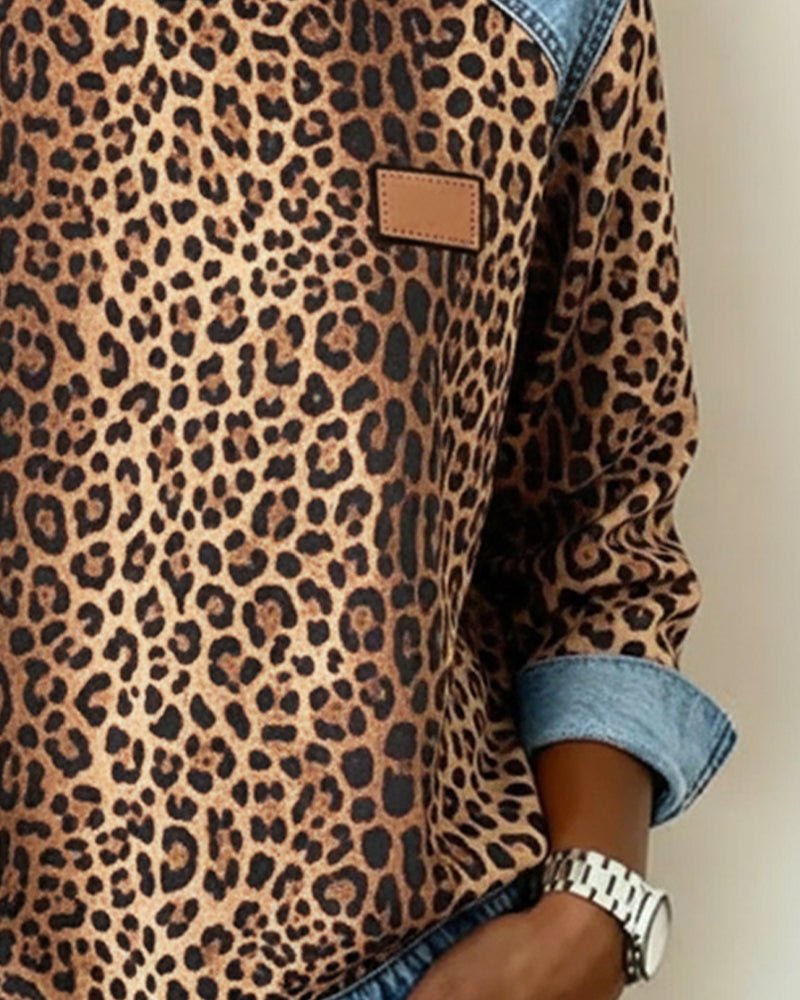 Close-up of the leopard print sleeve and chest detail