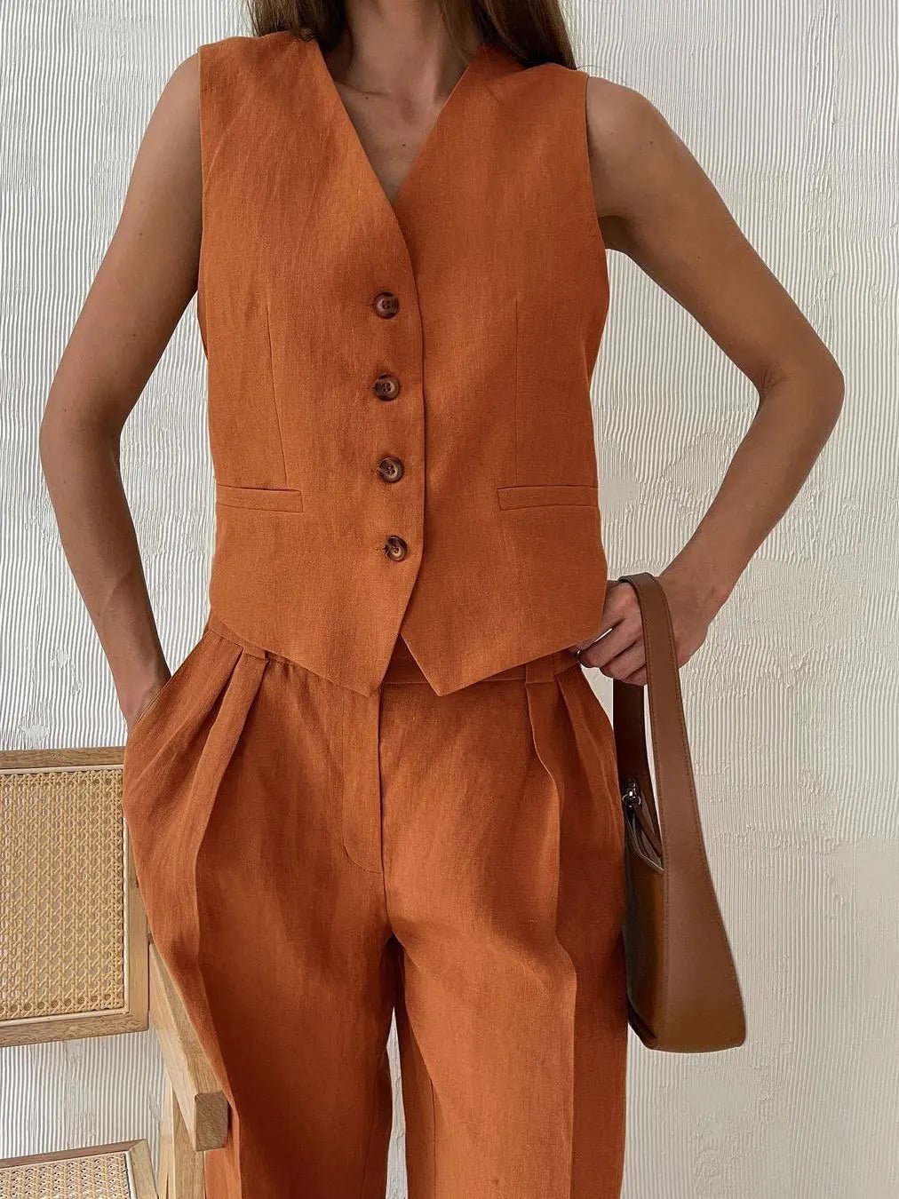 Tailored vest and wide leg trousers set viewed from the side
