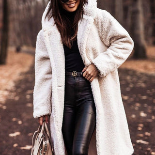 Full length view of casual women's winter coat in neutral beige tone