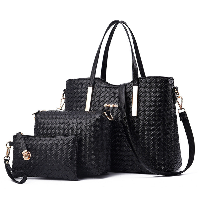 Black women's luxury handbag set with shoulder strap and matching pouches