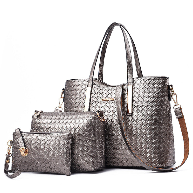 Detailed shot of the metallic clasp and secure closure on the luxury handbag accessory.