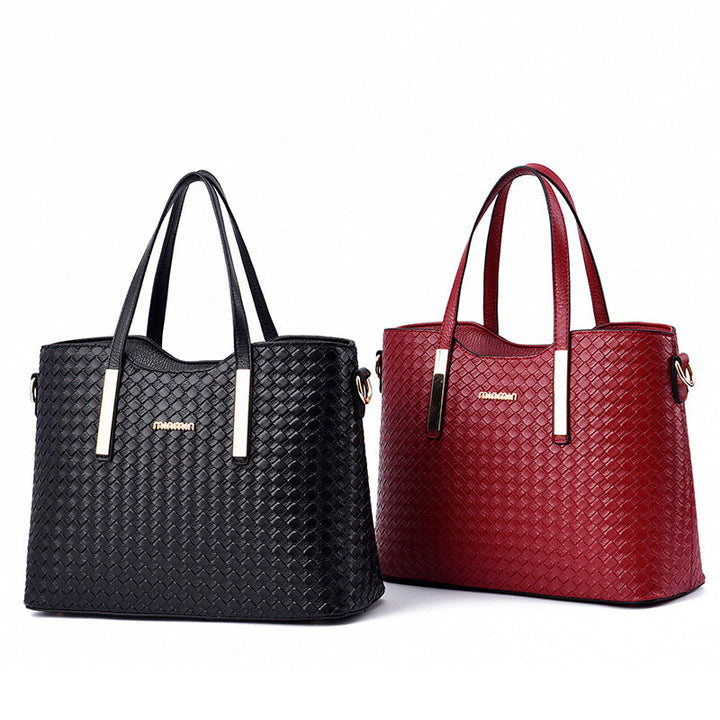 Side view of the elegant women's luxury handbag showing structured design and durable hardware.