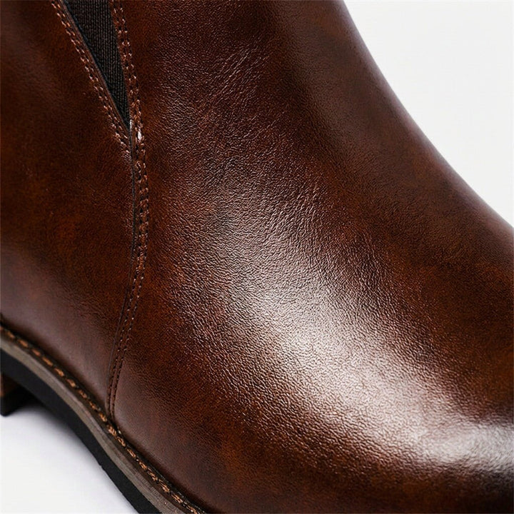 Close-up of textured brown boot material