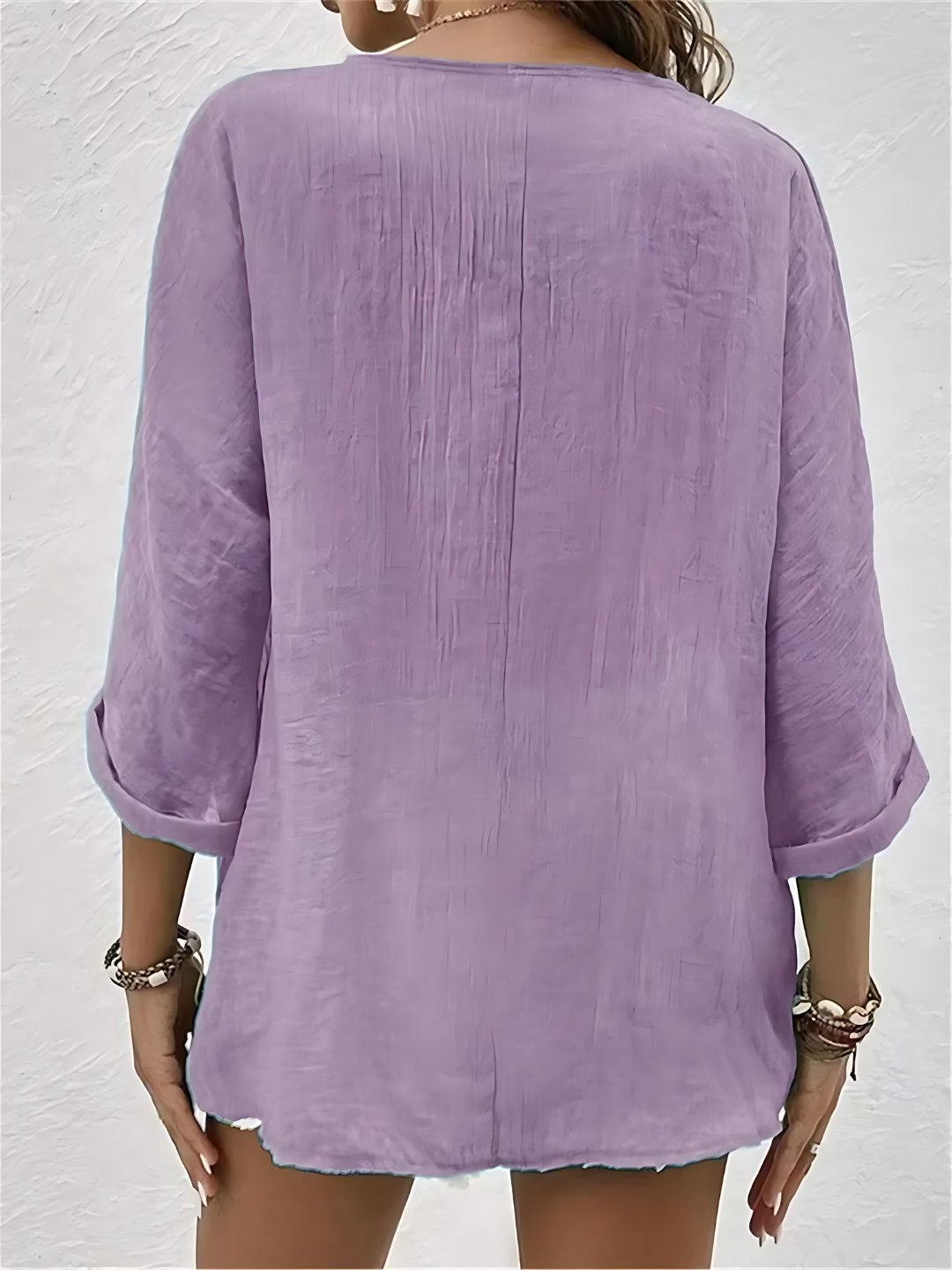 Front view of casual lightweight V-neck top for women