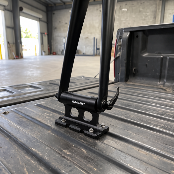 Black front fork mount bike carrier installed in a truck bed