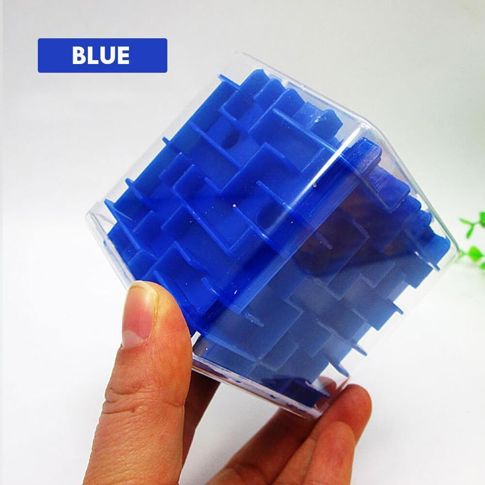 Close-up of the 3D cube puzzle maze toy showing the rolling steel ball inside the track.