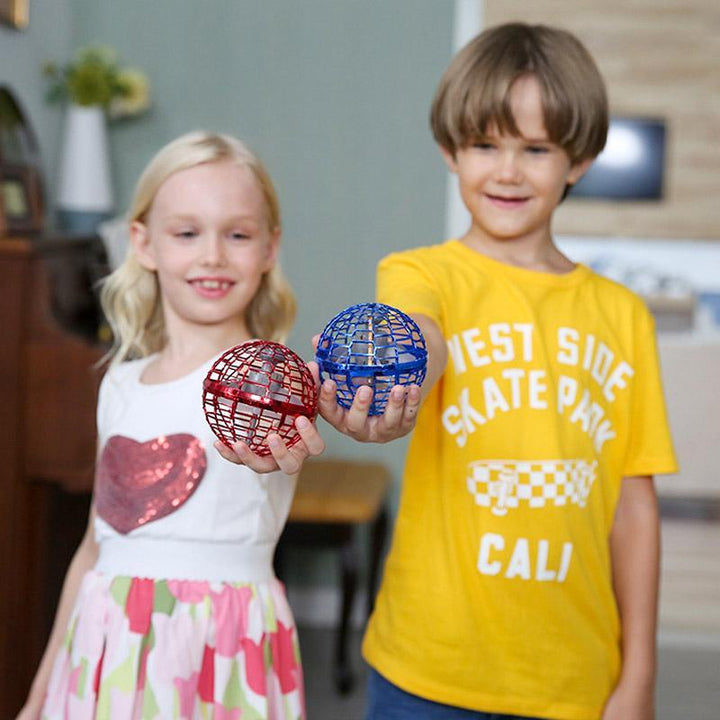 Kids toy hoverball mini drone outdoors demonstrating safe finger protection