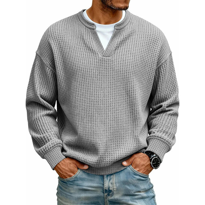 Man wearing a grey textured waffle long sleeve shirt