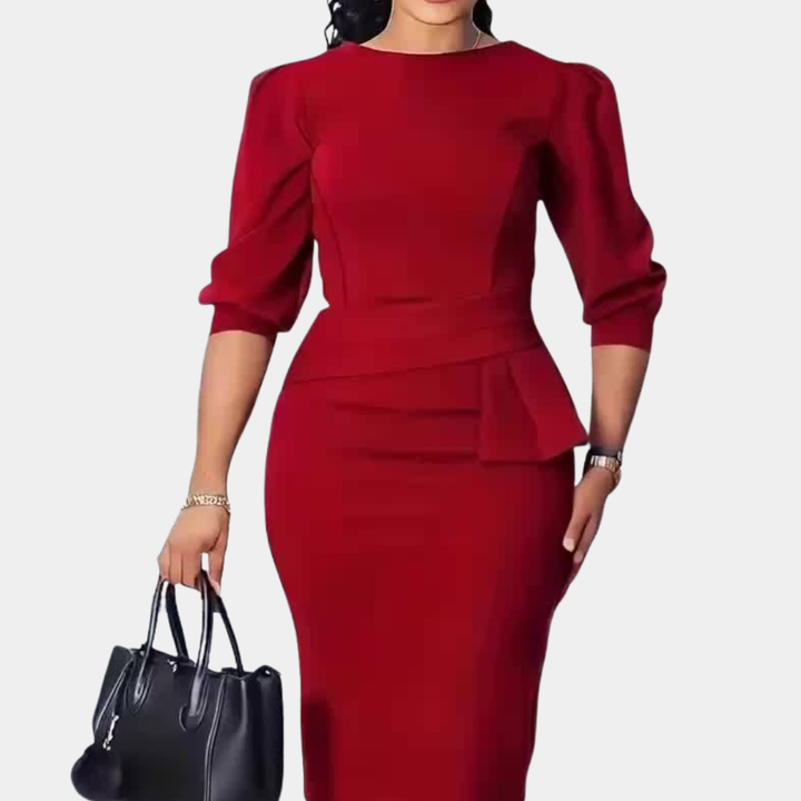 Woman wearing a solid red ruffle midi dress with three-quarter sleeves holding a black handbag