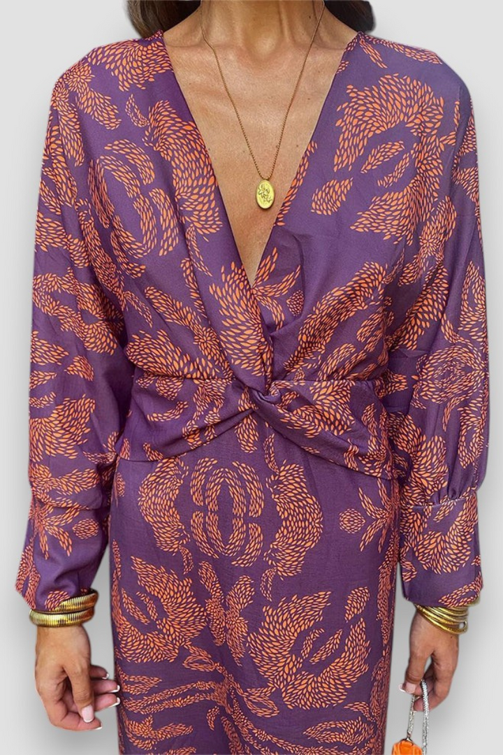 Full length view of floral long sleeve midi dress styled for women