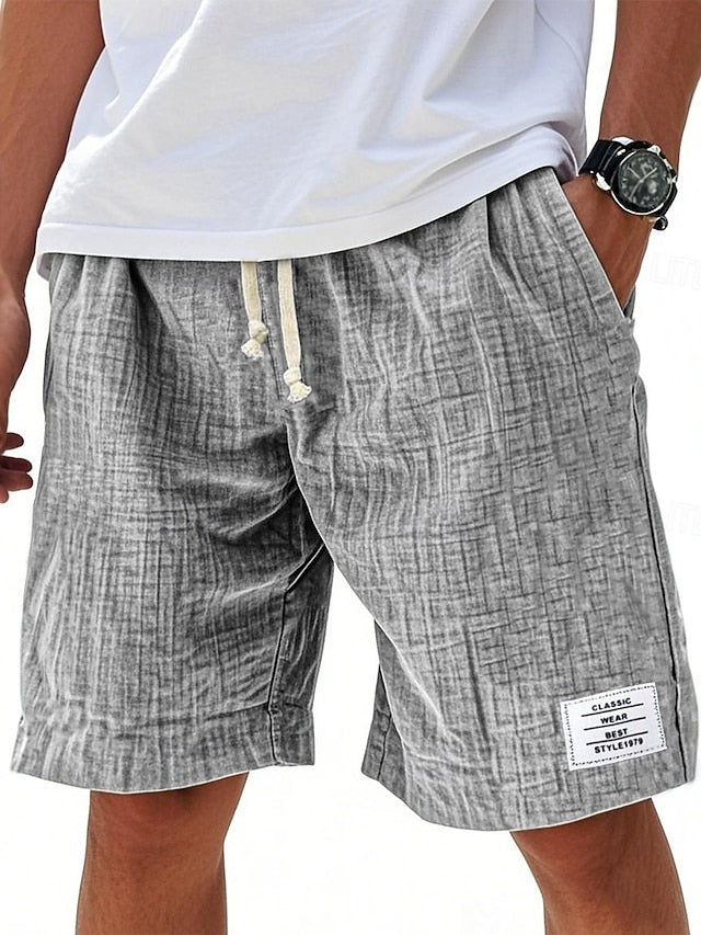 Close-up of fabric texture on mens solid color casual shorts
