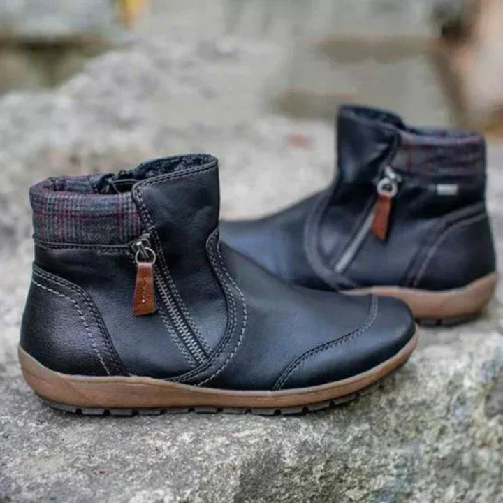 Black orthopedic waterproof ankle boot with textured collar trim