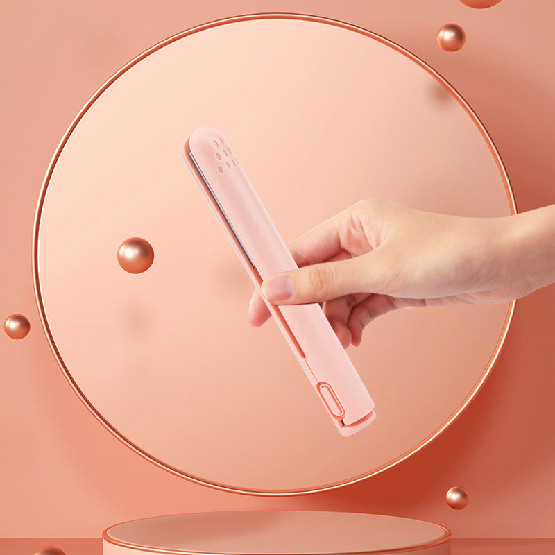 Close-up of ceramic hair tool heating plates on the mini hair styling iron