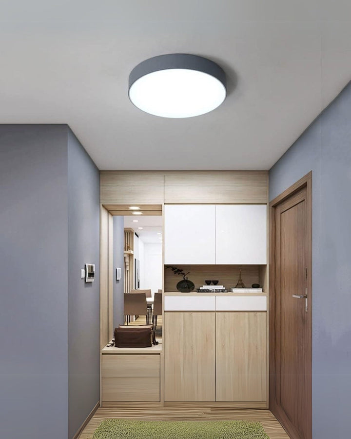 Detailed shot of the metal rim on the circular minimalist ceiling lamp