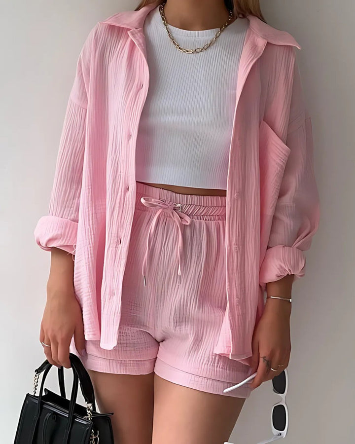 Close-up of the collar and button details on the matching set top