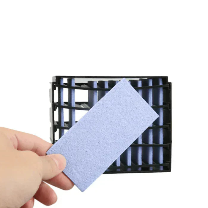 Compact usb cooler placed next to a laptop for personal workspace cooling comfort