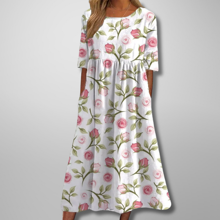 Full view of women's floral midi dress highlighting relaxed silhouette