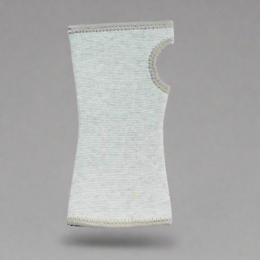 Unisex orthopaedic wrist compression sleeve shown worn on forearm