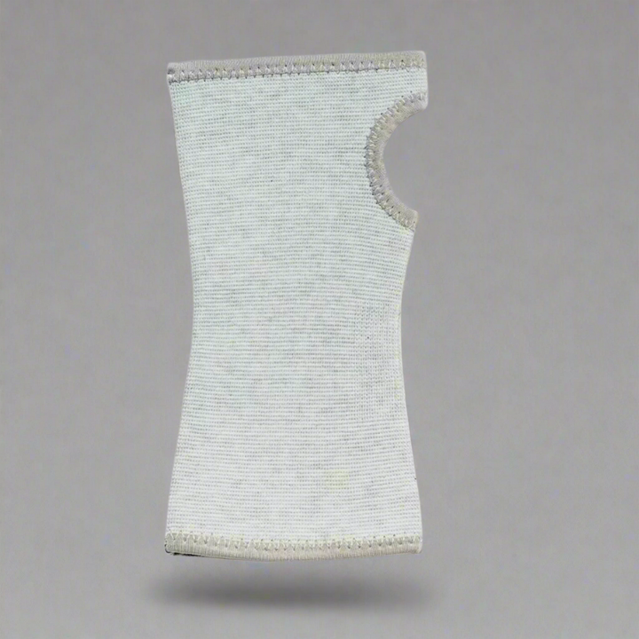 Unisex orthopaedic wrist compression sleeve shown worn on forearm