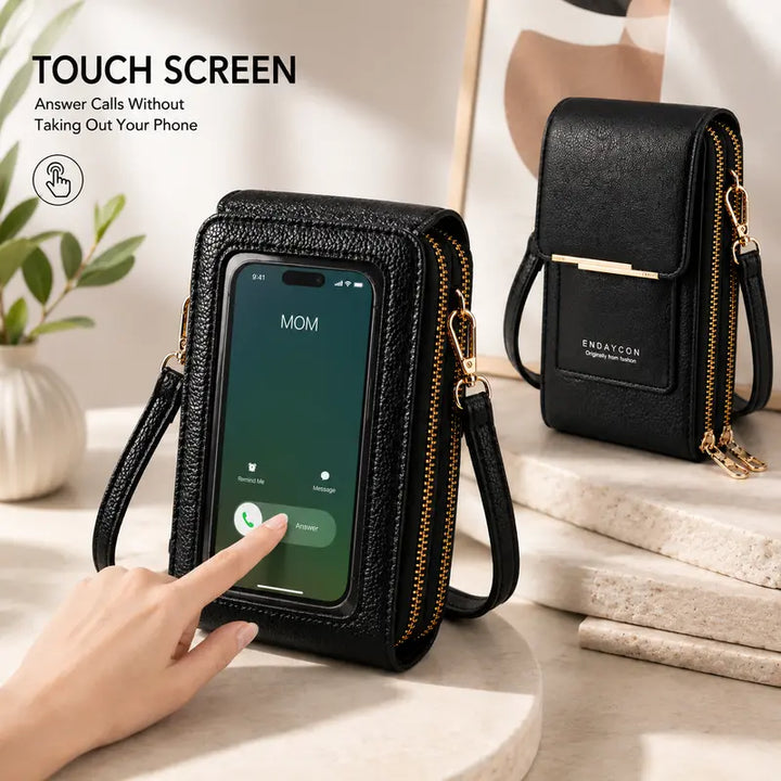 Person using a smartphone through the clear touchscreen window of a black crossbody bag